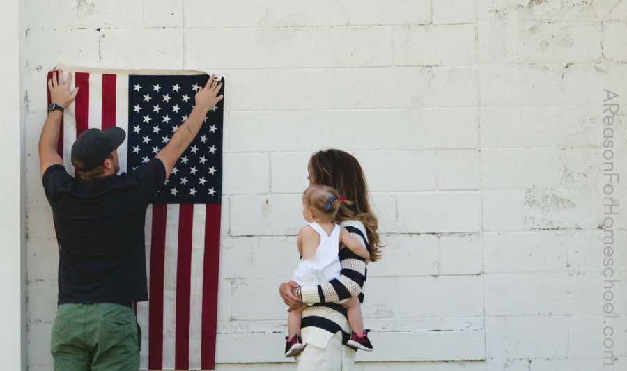 Father Mother and Child With American Flag for Memorial Day