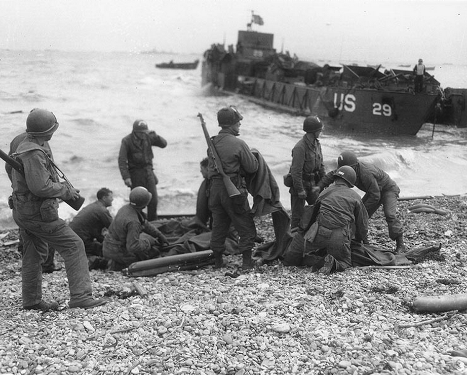 Troops giving first aid to survivors of sunken landing craft - A Reason ...